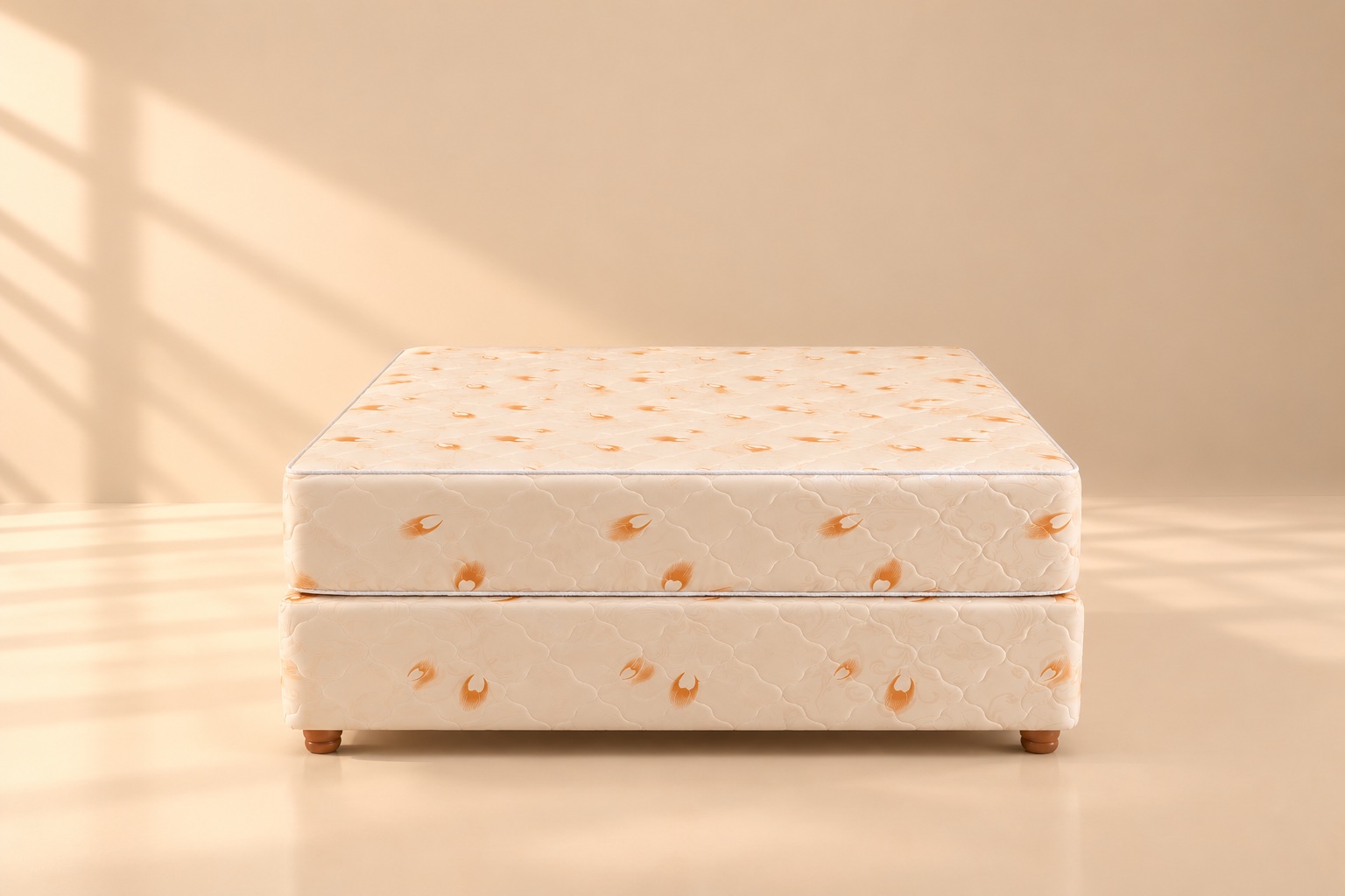 Colchón y base sommier en tonos crema con patas de madera